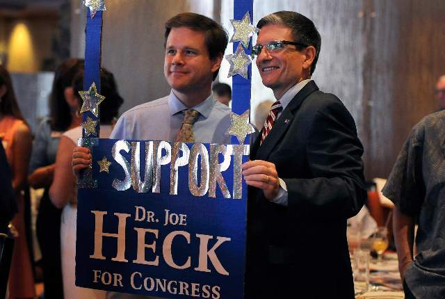 U.S. Rep. Joe Heck, R-Nev., right, poses with Ed Williams during the Nevada Republican Men‘s Club luncheon. (Photo by David Becker, Las Vegas Review-Journal)