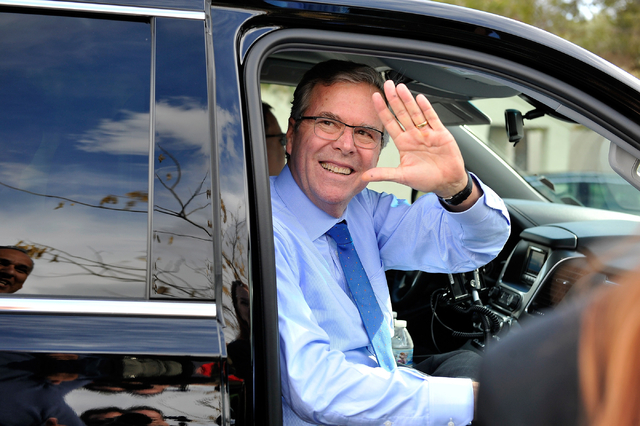 Former Florida Gov. Jeb Bush waves as he departs the Mountain Shadow Community Center in Sun City Summerlin after speaking in Las Vegas Monday, March 2, 2015. (Photo by David Becker/Las Vegas Review-Journal file)