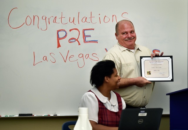 One of the 21 Nevada veterans received Friday, during their graduation, her Certificate of Completion for the Platform to Employment program, sponsored by the NV Department of Employment, Training, and Rehabilitation. (Courtesy: Las Vegas Review-Journal)